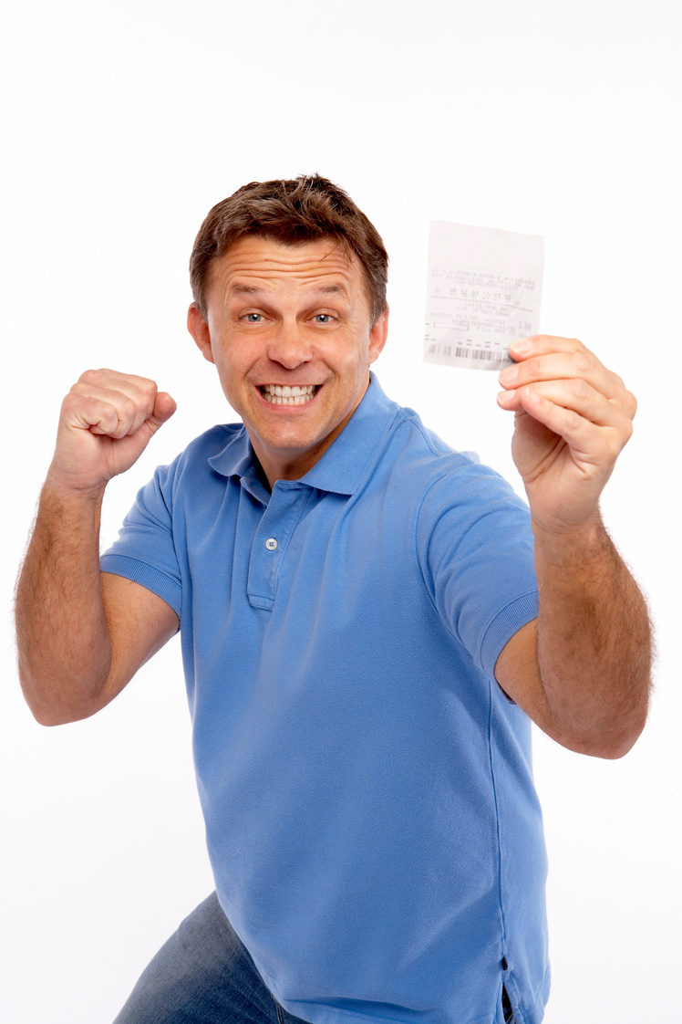 Man with lottery ticket